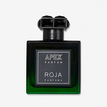 A bottle of Roja Parfums Apex Pour Homme features a green and black gradient glass body, square black label with silver lettering, and a black geometric cap, all set against a white background.