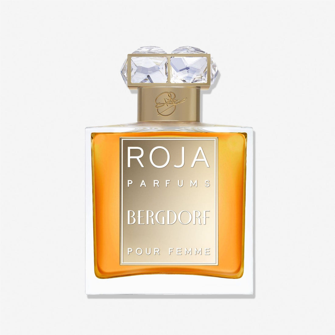 A bottle of Bergdorf by Roja Parfums, with an amber liquid, gold and silver label, and a faceted clear cap, displays its luxurious gardenia scent against a plain white background.