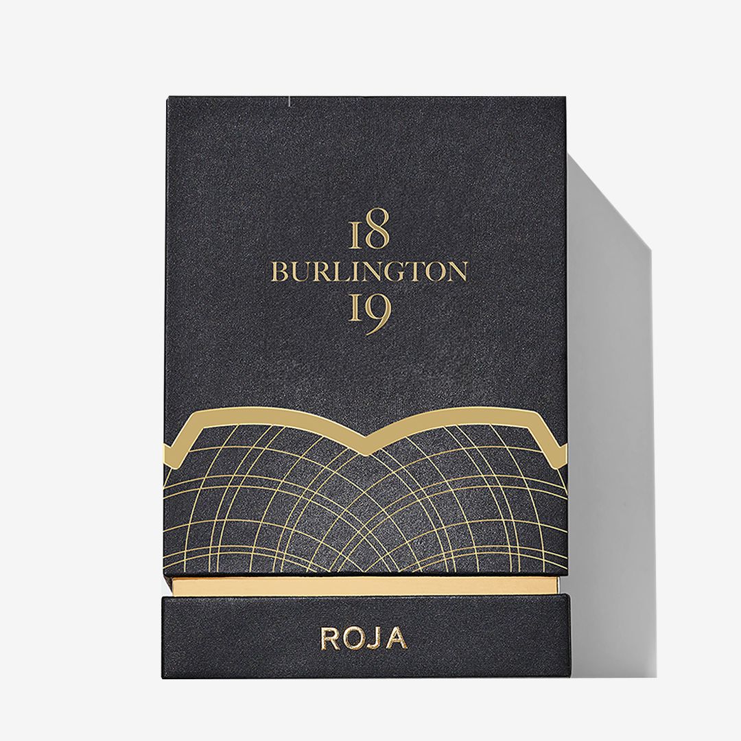 A black and gold geometric box evokes Burlington Arcades luxury, displaying Burlington 1819 at the top and Roja Parfums at the bottom. Set on a plain white background with a right shadow, it reflects award-winning perfumery.