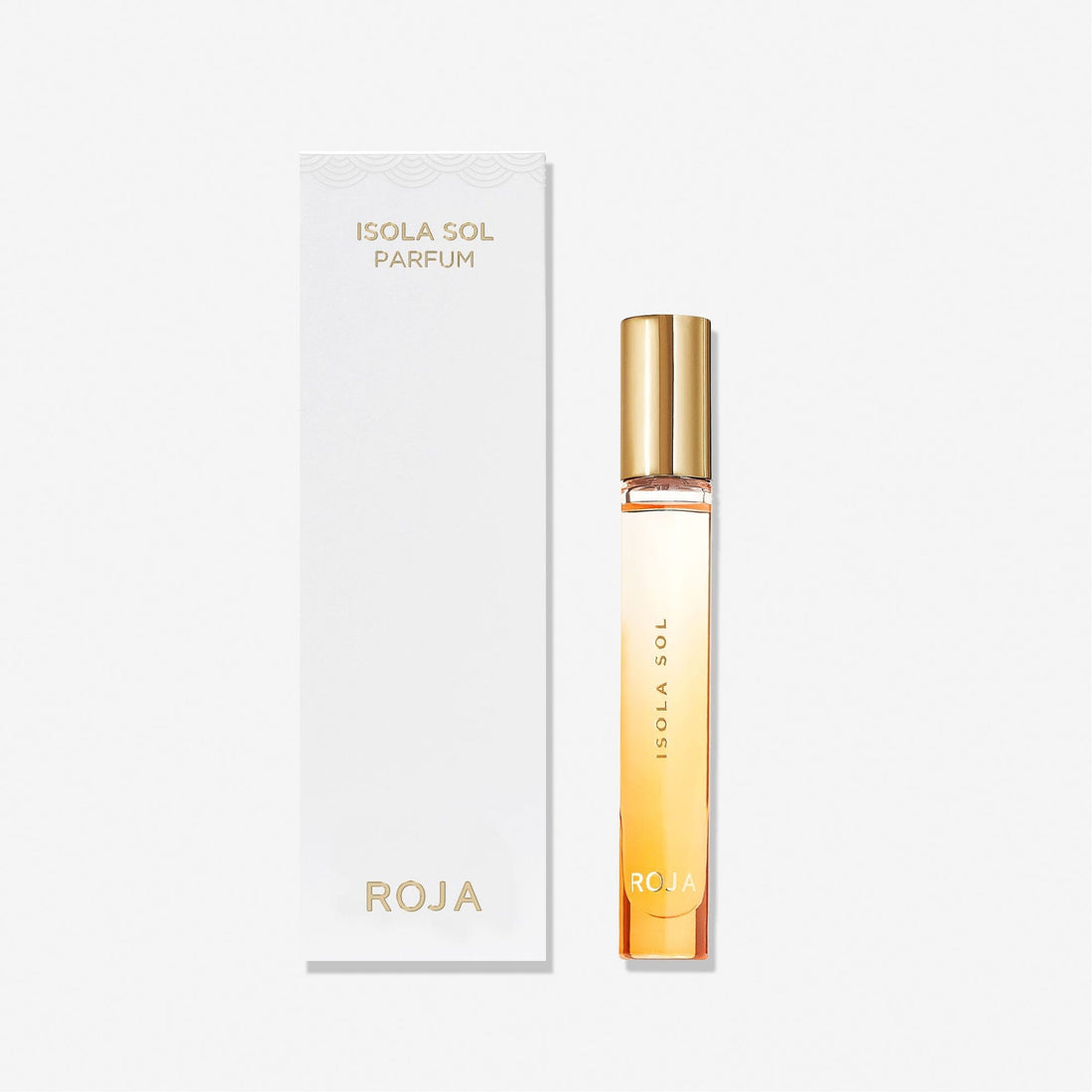 A slender bottle of Isola Sol by Roja Parfums with a gold cap stands beside its sleek white box, both adorned with minimalist gold lettering—capturing the essence of an island escape against a plain white background.