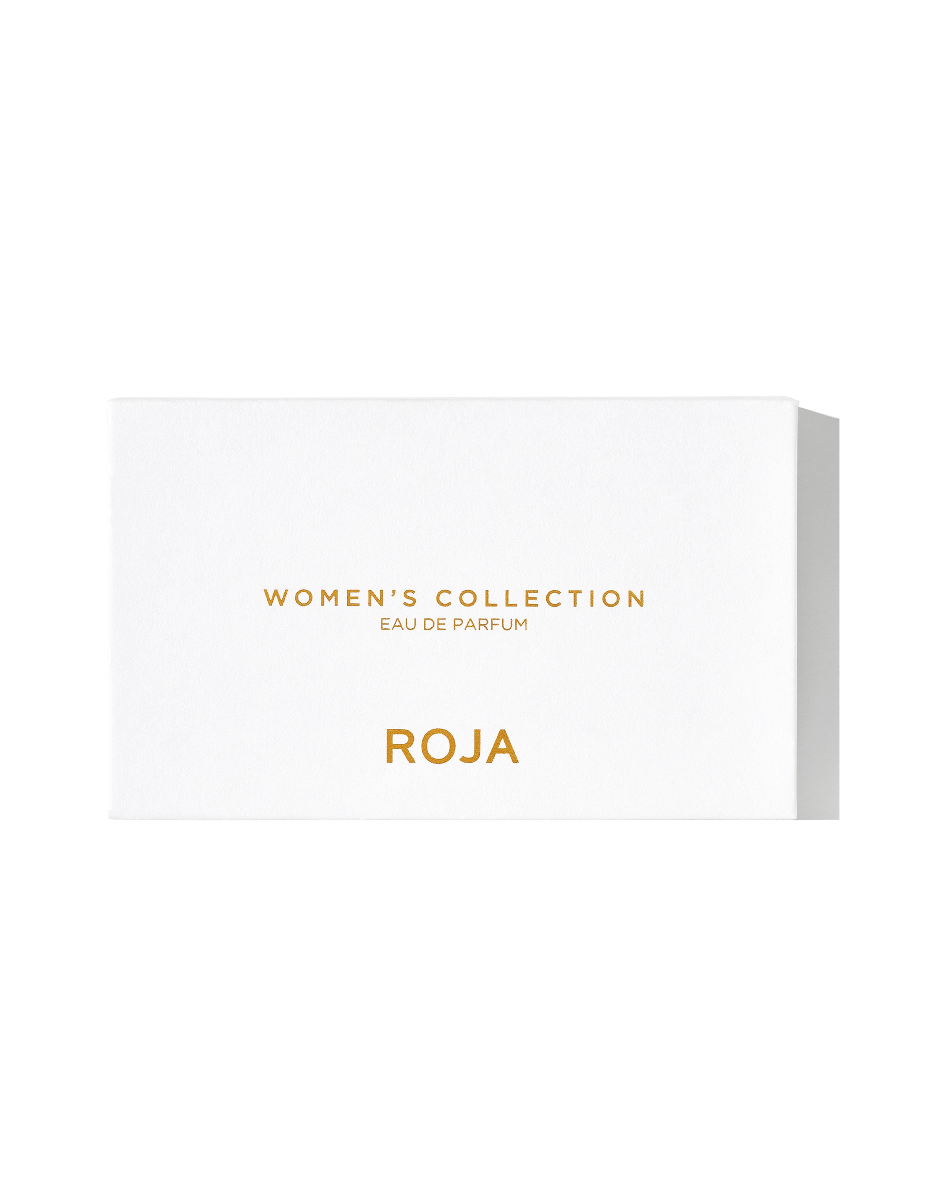 A white rectangular box with gold text that reads The Womens Discovery Collection and Roja Parfums on the front, set against a plain background—a stylish showcase for luxury perfume from Roja Parfums.