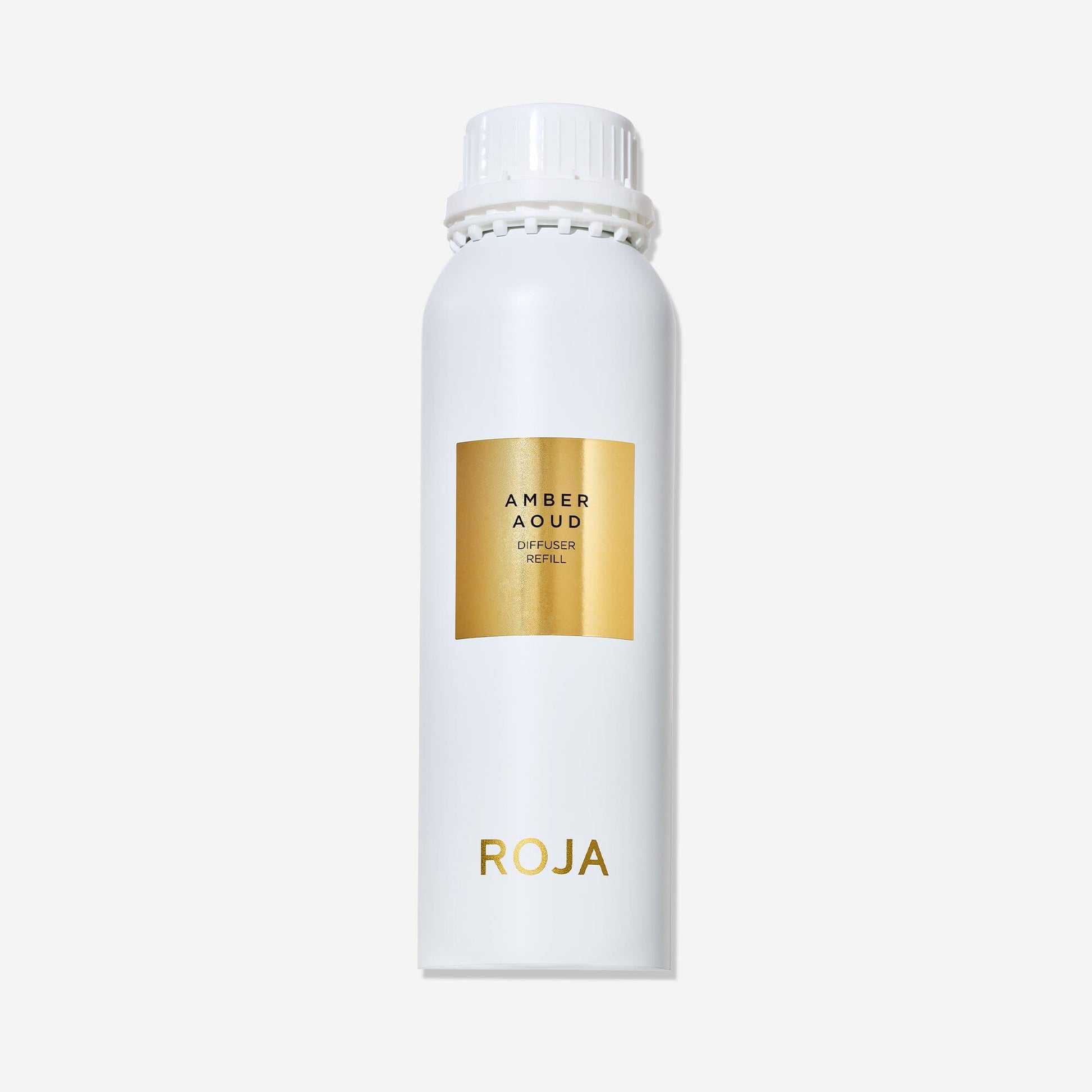 A white bottle with a gold label reading "Amber Aoud Diffuser Refill" and "Roja Parfums" at the base, topped with a white screw cap—ideal for pairing with your Amber Aoud candle or enjoying its rich, spicy aroma on its own.