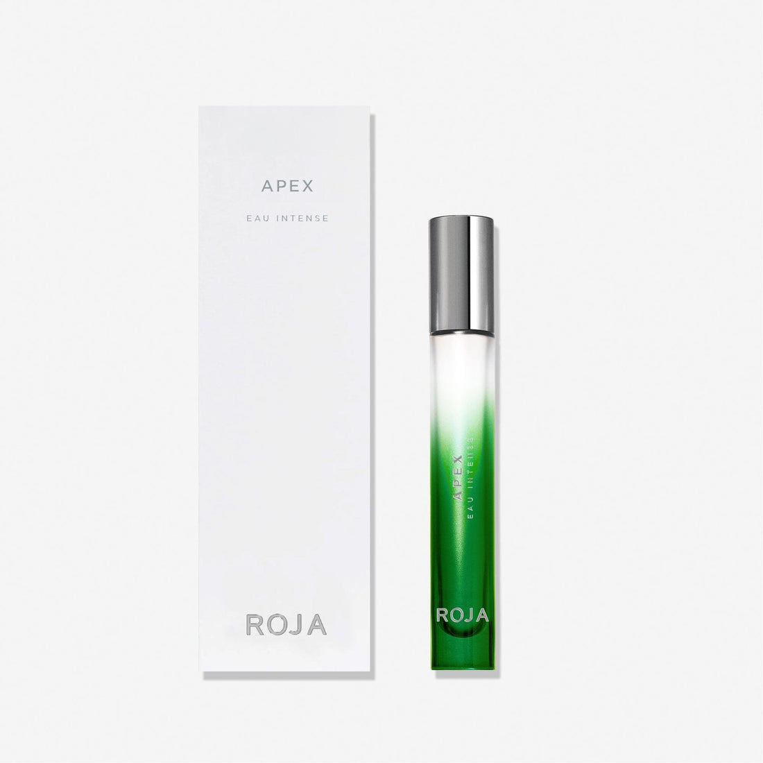 A tall, slim green glass bottle labeled Apex Eau Intense by Roja Parfums stands beside a matching white box, evoking natural perfumery and a refined Chypré accord, set against a plain white background.