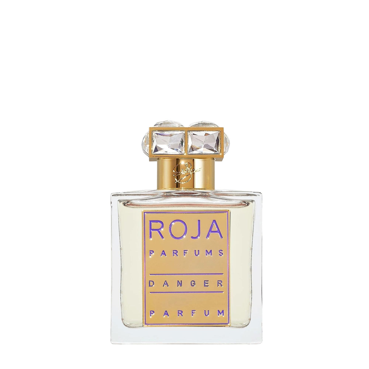 A clear glass bottle of Roja Parfums Danger Pour Femme Parfum features a gold cap adorned with two large square gems and purple label text; this aphrodisiac fragrance by Roja Parfums is an alluring blend that entices the senses.