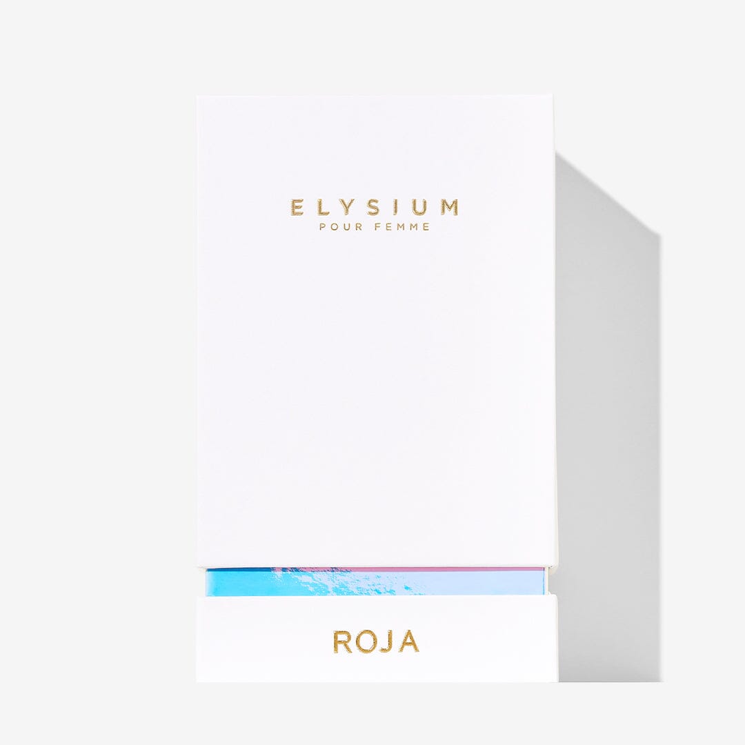 A white box with gold text reading “Elysium Pour Femme” and “Roja Parfums,” partially open to reveal a hint of color, features a minimal, elegant design reflecting an ethereal floral-inspired fragrance.