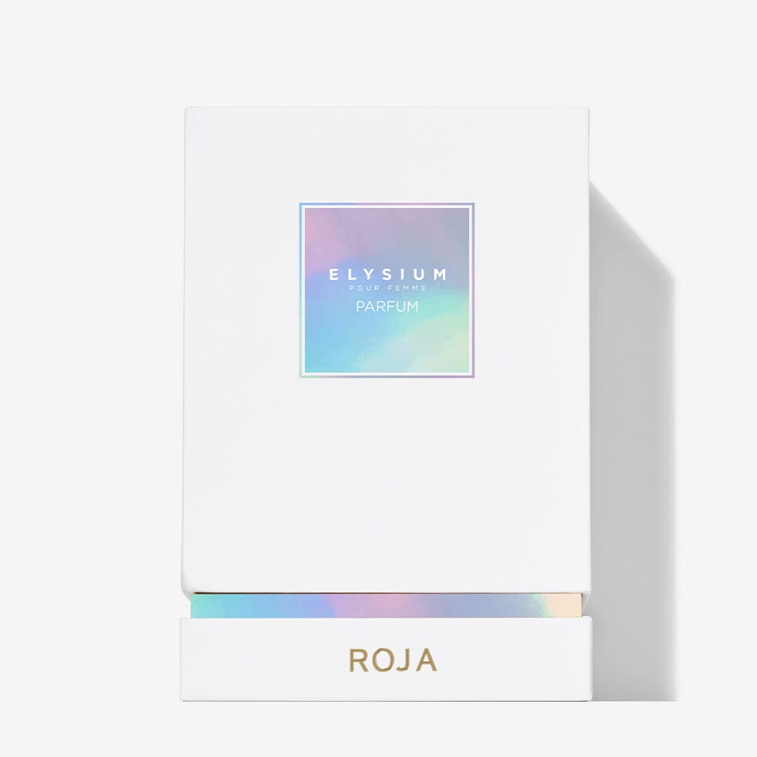 A white box with a holographic label reading Elysium Pour Femme by Roja Parfums hints at the ethereal scent inside; beneath the open flap, ROJA appears in gold letters against a white background.