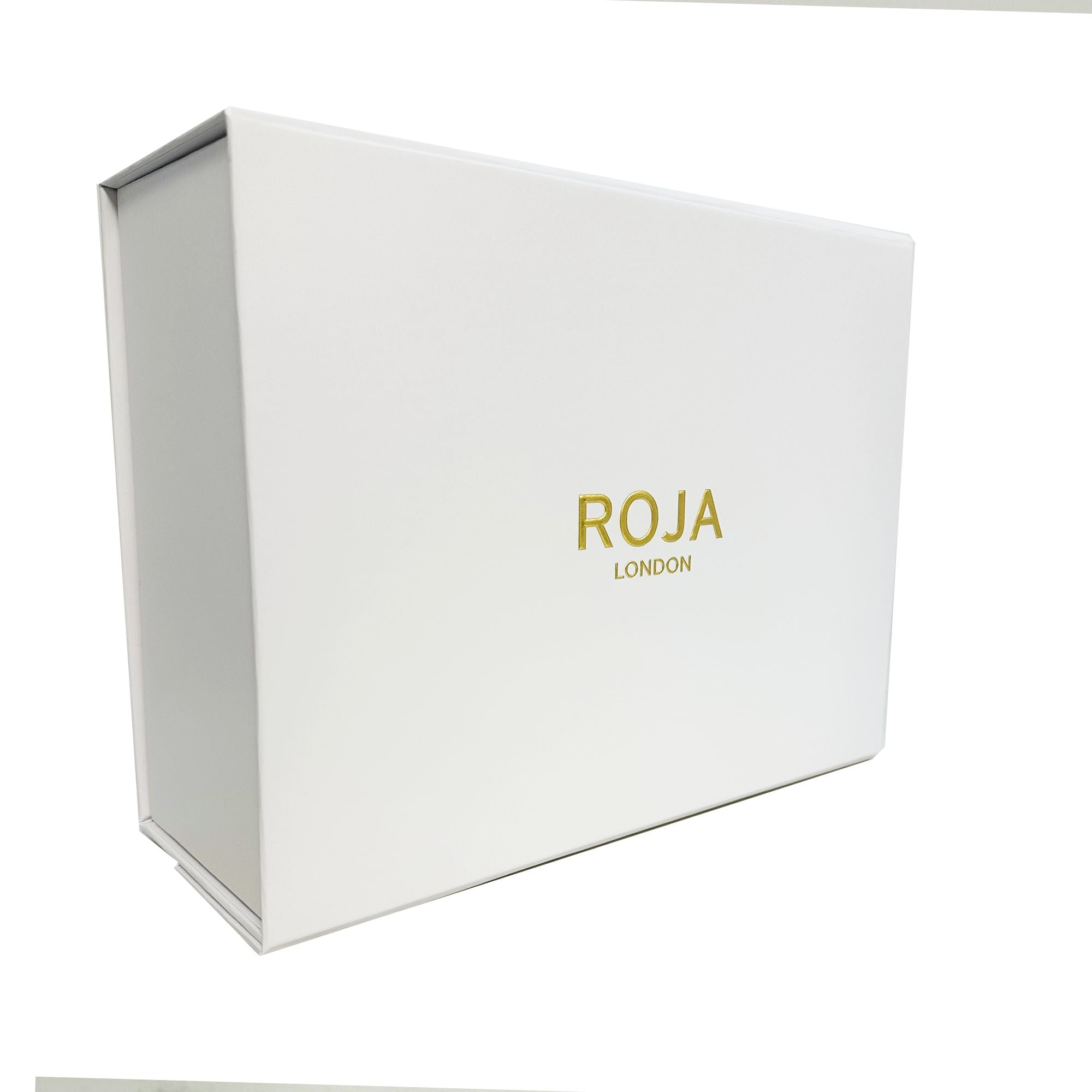A white rectangular box with ROJA PARFUMS and ENIGMA GIFT SET in gold on the front, photographed against a plain white background—a perfect showcase for this luxurious fragrance set.