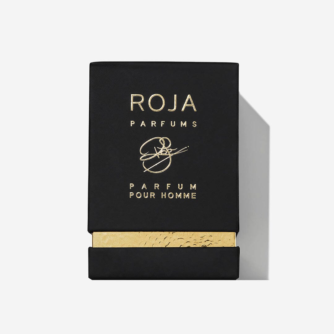 A black rectangular box with gold text reading Roja Parfums Fetish Pour Homme and a gold metallic strip at the bottom, used for packaging this luxury chypre leather fragrance.