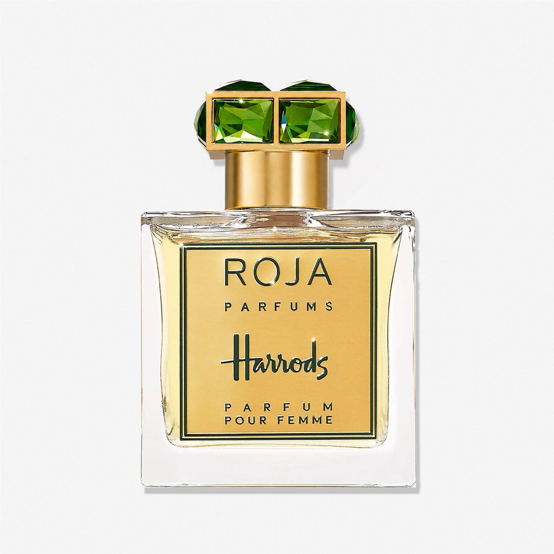 The image features a square glass bottle of Roja Parfums Harrods Pour Femme, distinguished by its gold label and green gemstone cap, set against a white background to embody the luxurious floral inspiration of this fragrance.