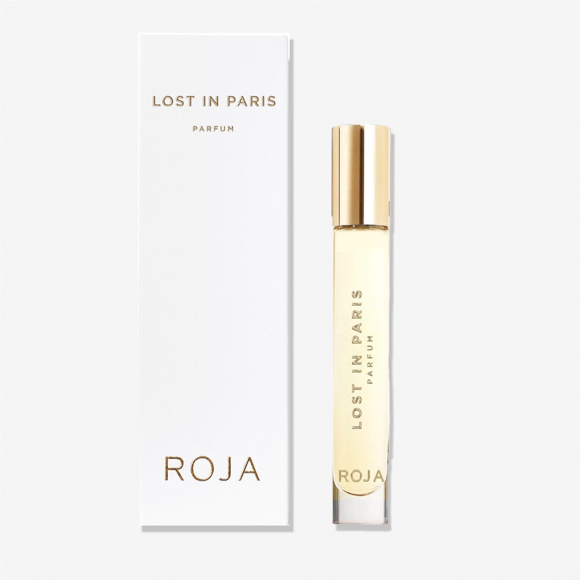A bottle of Lost in Paris by Roja Parfums (100% off) is displayed next to its white, gold-lettered box on a plain background—ideal for gifting or combining with a Free Gift BOGO Bundle from BOGOS.io.