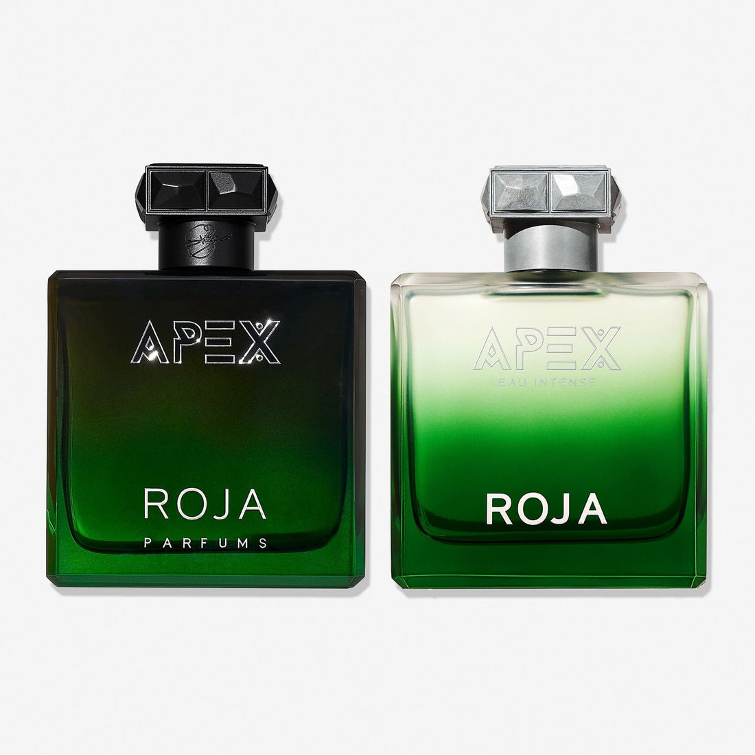 Two green gradient bottles in The Apex Gift Set by Roja Parfums—APEX EAU DE PARFUM with a black cap and deeper green, and APEX EAU INTENSE with a silver cap and lighter green—make the perfect luxe duo.
