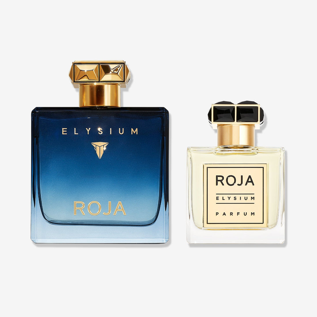 The Elysium Gift Set by ROJA London features two bottles: one blue with a gold cap, and one smaller clear bottle with pale yellow liquid and a black-and-gold cap—ideal for fragrance layering, both showcased on a white background.