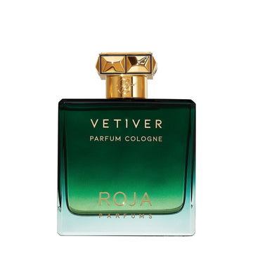 A green glass bottle of Roja Parfums Vetiver Pour Homme, adorned with elegant gold accents, embodies refined masculine fragrance against a crisp white backdrop.
